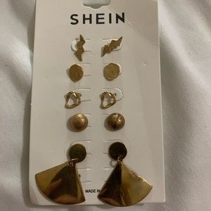 set of gold earrings